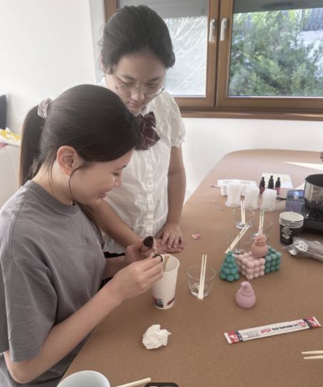 Students making candles for the Light for Hope campaign